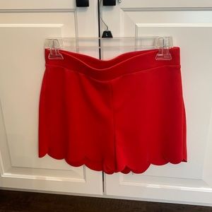 Express red scalloped shorts